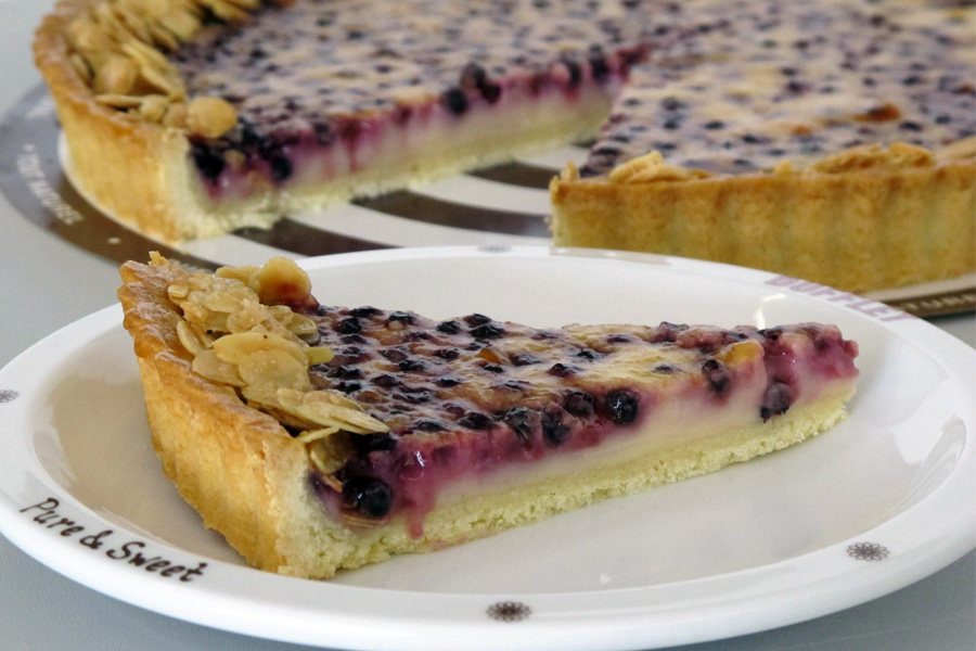 Wild blueberry buttermilk tart with sugared almonds Picture
